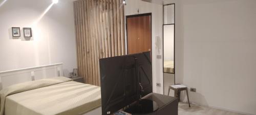TV a/nebo společenská místnost v ubytování Studio Flat Rome Metro Garbatella