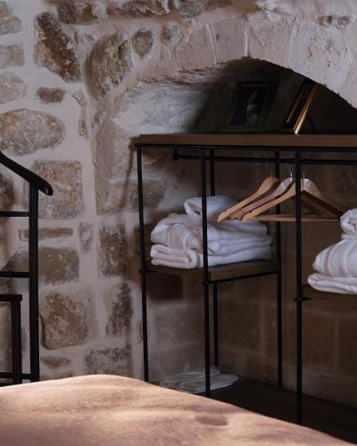 Postel nebo postele na pokoji v ubytování Kaia House