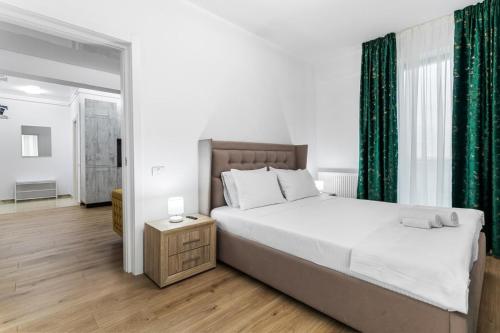 Ένα ή περισσότερα κρεβάτια σε δωμάτιο στο Solea Apartament