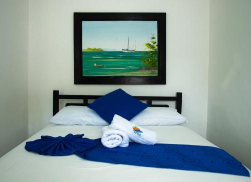 Katil atau katil-katil dalam bilik di Casa Hotel Las Antillas