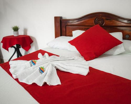 Katil atau katil-katil dalam bilik di Casa Hotel Las Antillas