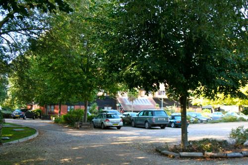 a group of cars parked in a parking lot at Ellington Lodge at The Concorde in Eastleigh