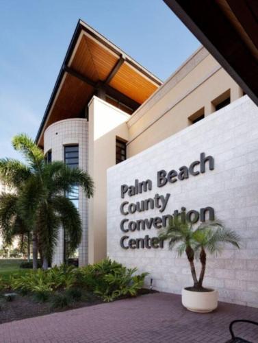 a building with a sign that reads palm beach county convention center at Beautiful home in West Palm - 5 min to Airport in West Palm Beach