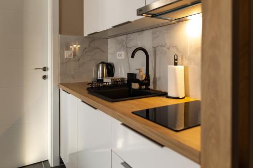 Apartmani Arijaにあるキッチンまたは簡易キッチン