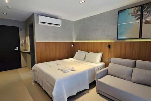 Ένα ή περισσότερα κρεβάτια σε δωμάτιο στο BEIRA MAR Beach Haus | Flat com Conforto e Estilo