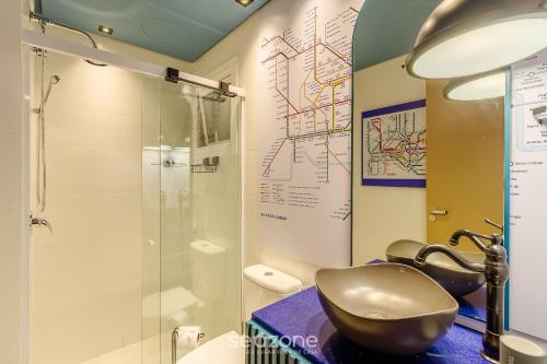 Ένα μπάνιο στο Apto aconchegante temático em Canela | DAL221