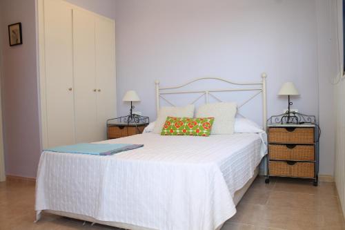 Postel nebo postele na pokoji v ubytování Apartamento Calypso