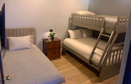 Ένα ή περισσότερα κρεβάτια σε δωμάτιο στο Casa Bella 2