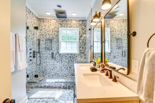 a bathroom with a sink and a shower at Wremy House 5 Blocks to Main St in Starkville! in Starkville