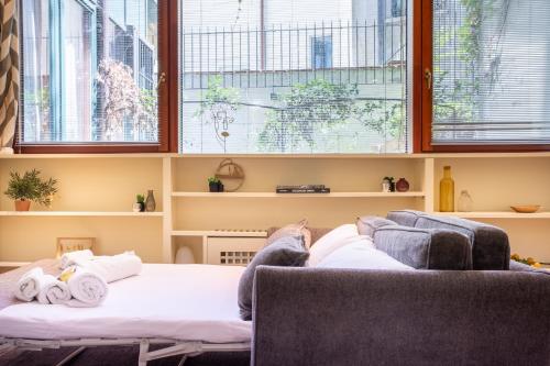 Ένα ή περισσότερα κρεβάτια σε δωμάτιο στο Duomo 500 mt - Suite between art and design with WI-FI