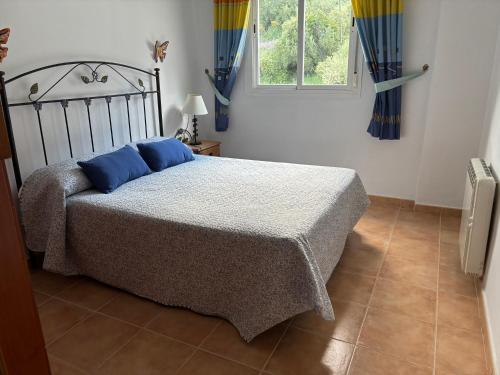 A bed or beds in a room at Casa Isabel