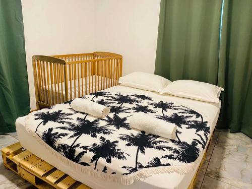 Postel nebo postele na pokoji v ubytování Herehiti Sweet House