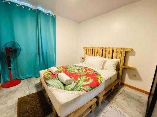 Postel nebo postele na pokoji v ubytování Herehiti Sweet House