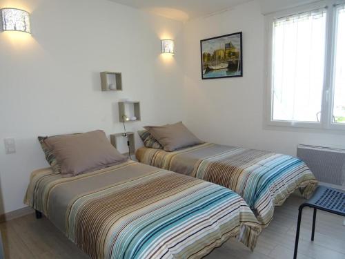 Maison rénovée avec jardin privatif, proche des Sables d'Olonne, parking et Wifi inclus