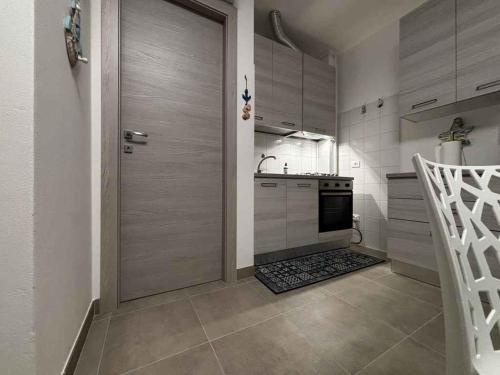 Dapur atau dapur kecil di Apartment in Rosolina Mare 54390