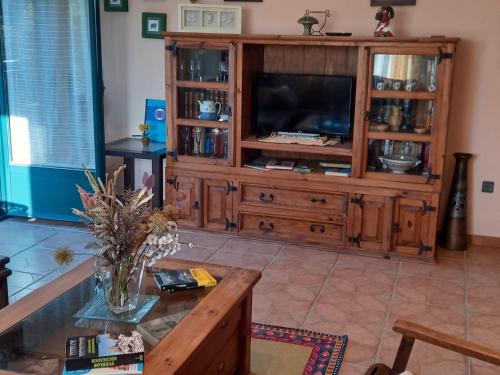 TV a/nebo společenská místnost v ubytování CASA RuRAL LOS DESAYUNOS