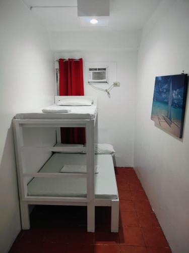 Cama o camas de una habitación en Stay Malate (Wanderers Guest House)