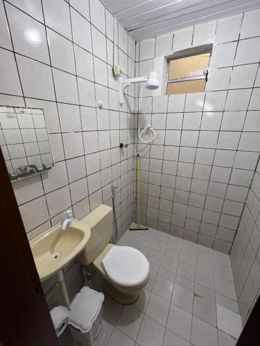 Koupelna v ubytování Residencial Dragão