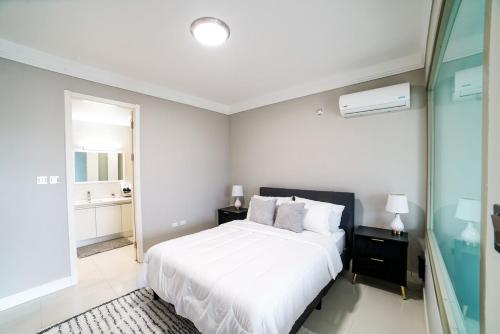 Ένα ή περισσότερα κρεβάτια σε δωμάτιο στο Penthouse Suite 20 South - KINGSTON - FIWI