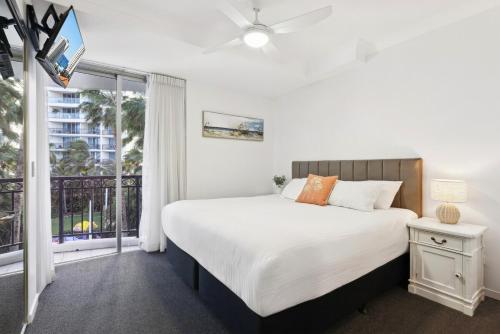 Ένα ή περισσότερα κρεβάτια σε δωμάτιο στο Surfers Paradise 2 bedroom Oasis