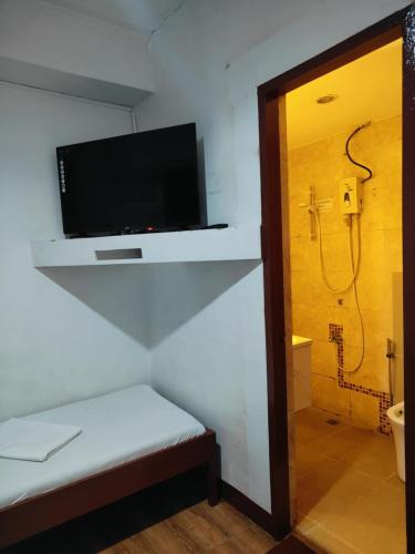 Un baño de Stay Malate (Wanderers Guest House)