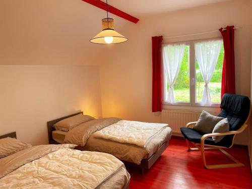 Ένα ή περισσότερα κρεβάτια σε δωμάτιο στο Gîte du Marais - Proche Chambord, Wifi, Animaux admis, Parking privé - FR-1-491-467