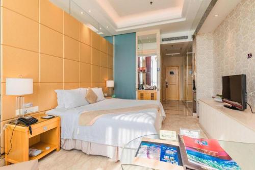 Postel nebo postele na pokoji v ubytování Regency Hotel