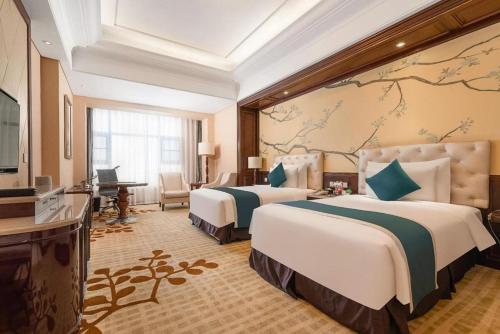 Ένα ή περισσότερα κρεβάτια σε δωμάτιο στο Argyle Hotel
