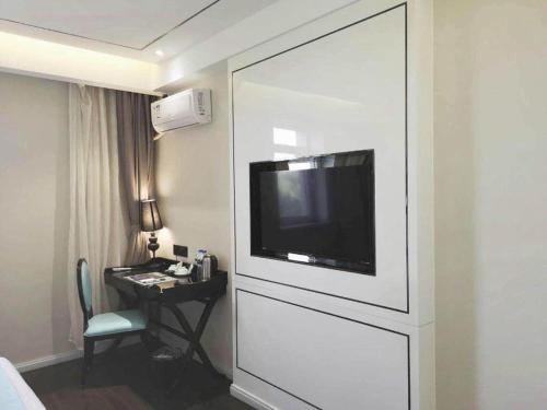 Televisyen dan/atau pusat hiburan di Xana Lite Shenyang Beiling Park Liaoning Building Branch