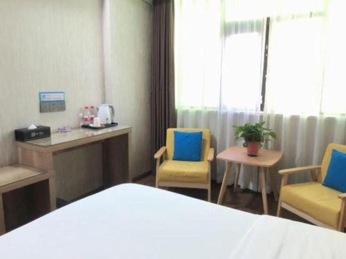 Ένα ή περισσότερα κρεβάτια σε δωμάτιο στο PAI Hotel·Linfen Hongdong Lily Town