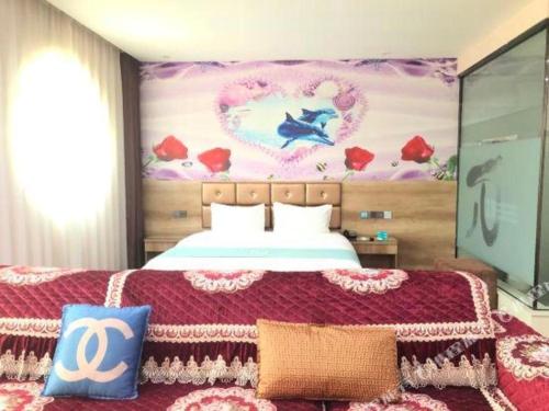 Ένα ή περισσότερα κρεβάτια σε δωμάτιο στο PAI Hotel·Linfen Hongdong Lily Town