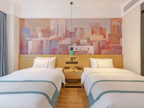 Letto o letti in una camera di City Comfort Inn Taizhou International Exhibition Center