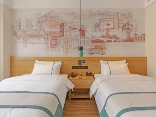 Letto o letti in una camera di City Comfort Inn Taizhou International Exhibition Center