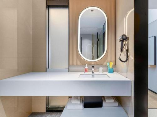 Ένα μπάνιο στο City Comfort Inn Wuhan International Expo Center Qianjin Village Metro Station