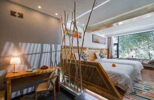 Huaqi Country House B&Bにあるベッド