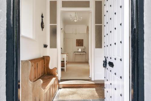 a hallway with a door leading into a room at Wetherlam in Ambleside