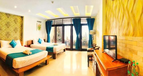 Katil atau katil-katil dalam bilik di Whale Ocean View Hotel