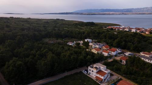 an aerial view of a town and a body of water at Villa Amphora in Vir