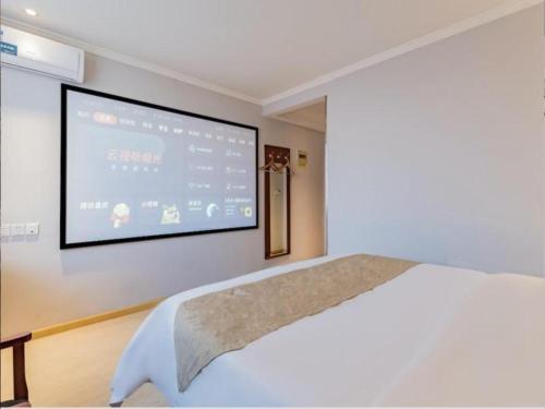 Letto o letti in una camera di GreenTree Inn Beijing Tonzhou Maju Bridge No.2 Express Hotel