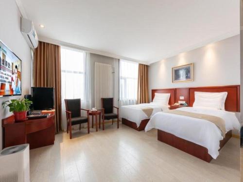 Letto o letti in una camera di GreenTree Inn Beijing Tonzhou Maju Bridge No.2 Express Hotel