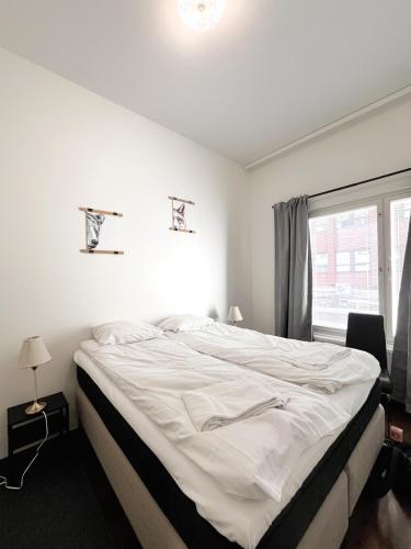 Katil atau katil-katil dalam bilik di Modern One bedroom with Sauna