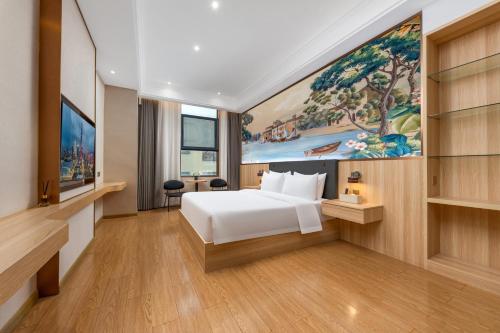 Uma cama ou camas num quarto em Shenzhen-Hong Kong Hui Hotel, Futian Port Convention and Exhibition Center