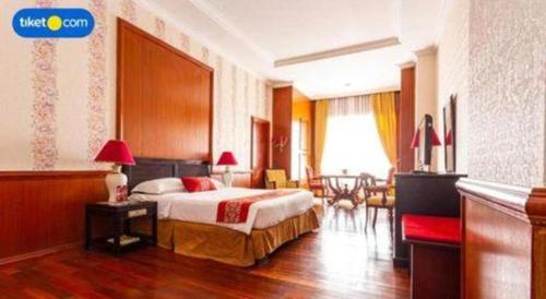 Кровать или кровати в номере Gran Senyiur Hotel
