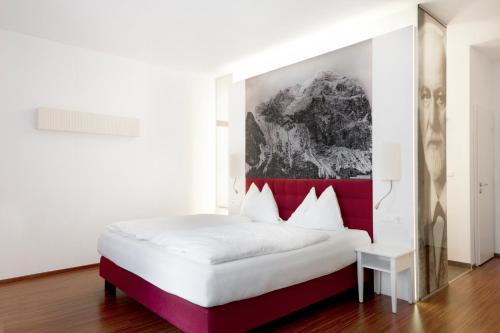 
Ein Bett oder Betten in einem Zimmer der Unterkunft Hotel Payerbacherhof
