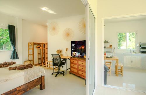 TV/Unterhaltungsangebot in der Unterkunft Boho House - 2mn Srithanu - King Bed - 4K SmartTV