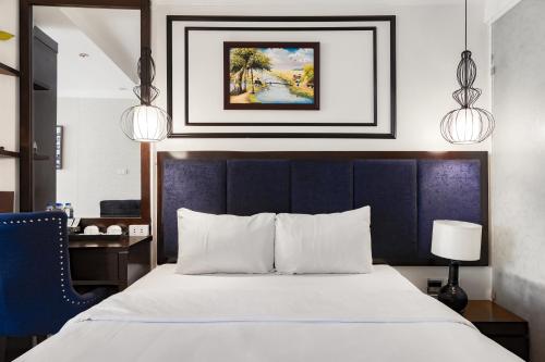 Postel nebo postele na pokoji v ubytování Bella Rosa Trendy Hotel & Spa