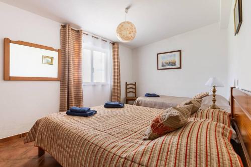 Ένα ή περισσότερα κρεβάτια σε δωμάτιο στο Maison A Quinta V2B 7 Personnes