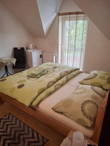 Ένα ή περισσότερα κρεβάτια σε δωμάτιο στο Vila Lesana