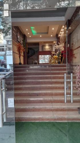 a set of stairs in front of a building at Seuiet Hs شهاب in Cairo