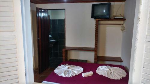 Et tv og/eller underholdning på Hotel Pousada Castanheiras do Village